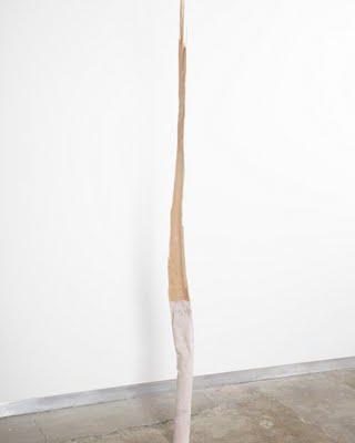 Molly Smith, Sure, 2012, Hydrocal, pigment,weight, rocks, and wood, 75 x 4 x 6 in., Courtesy the Artist and Kate Werble Gallery, New York, NY