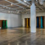 Lara Favaretto, Coppie Semplici / Simple Couples, 2009, Iron slabs, motors, electrical boxes, carwash brushes, wires, Installation dimensions variable