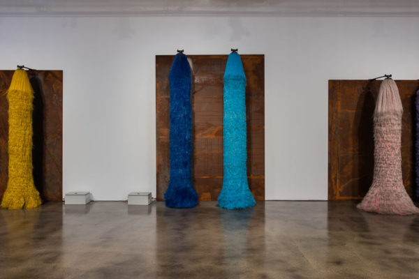 Lara Favaretto, <em>Coppie Semplici / Simple Couples</em>, 2009, Iron slabs, motors, electrical boxes, carwash brushes, wires, Installation dimensions variable, Museum of Contemporary Art Santa Barbara, 2019, Courtesy MCASB, Photo: Brian Forrest.